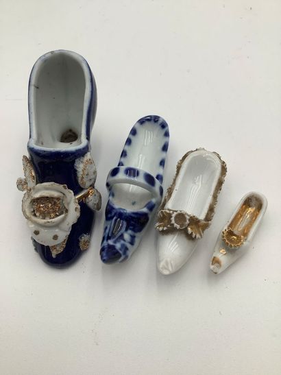 Regroupement de souliers miniatures en porcelaine...