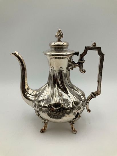 Theière en métal argenté. 
Poids total :...
