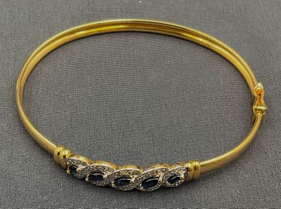 Bracelet jonc en or jaune ( 750/1000e), à...