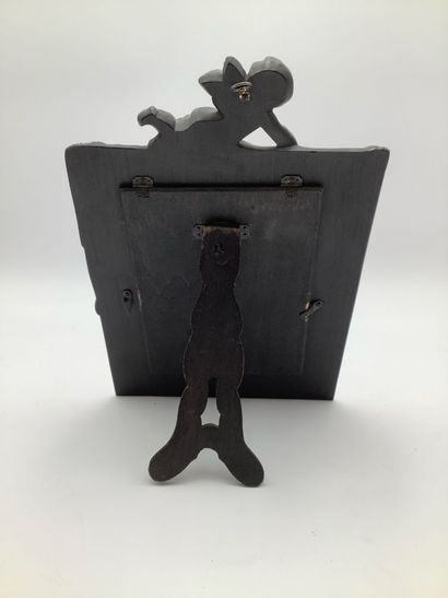 Cadre en ébène à décors d’angelot
29x19c...