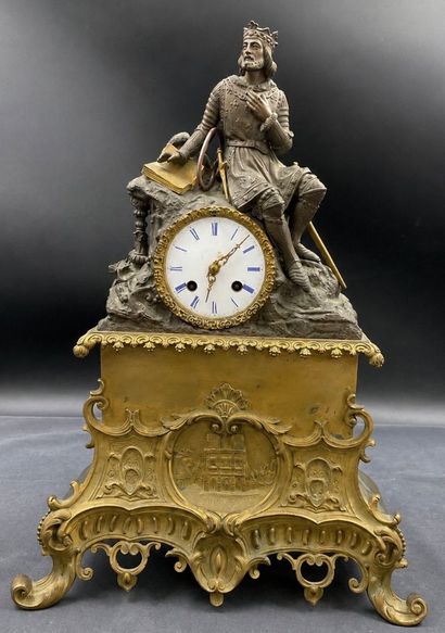 Pendule de cheminée en régule patiné et doré,...