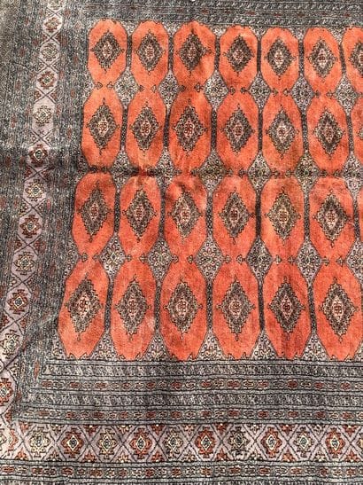 Large, handmade Bukhara-style rug in shades...