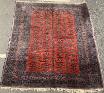 Large, handmade Bukhara-style rug in shades...