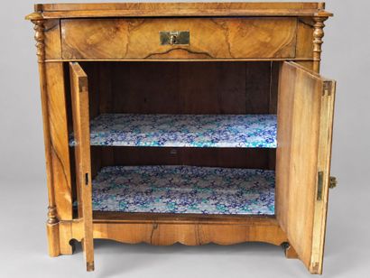 A low, rectangular, veneered Charles X sideboard...
