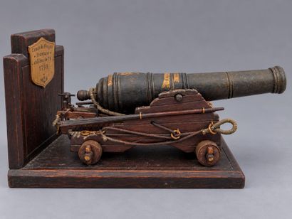 A pair of bookends featuring scale models...