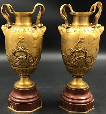 Paire de vases néo classique en bronze doré...