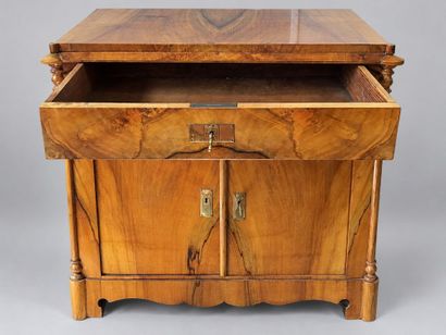 A low, rectangular, veneered Charles X sideboard...