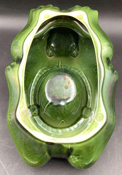 A large promotional ashtray featuring a frog...