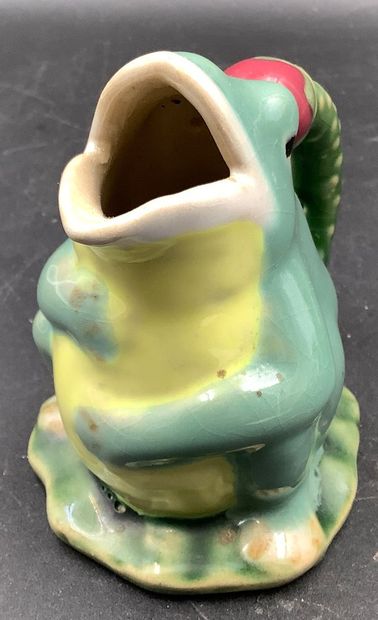 A large promotional ashtray featuring a frog...