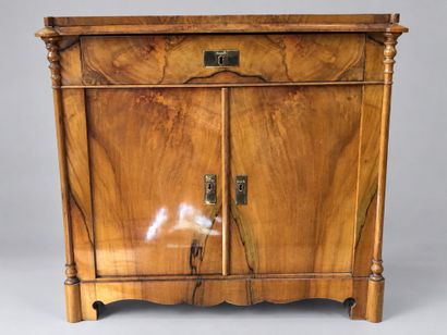 A low, rectangular, veneered Charles X sideboard...