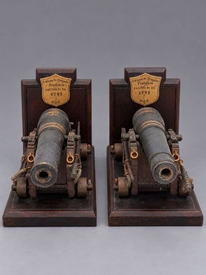 A pair of bookends featuring scale models...