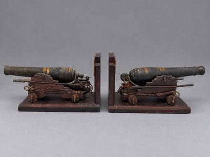 A pair of bookends featuring scale models...