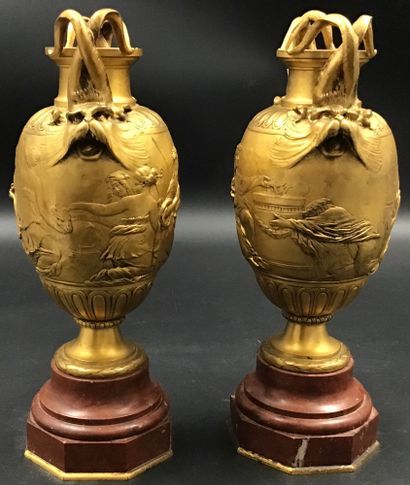 Paire de vases néo classique en bronze doré...