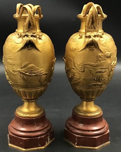 Paire de vases néo classique en bronze doré...