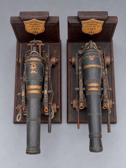 A pair of bookends featuring scale models...