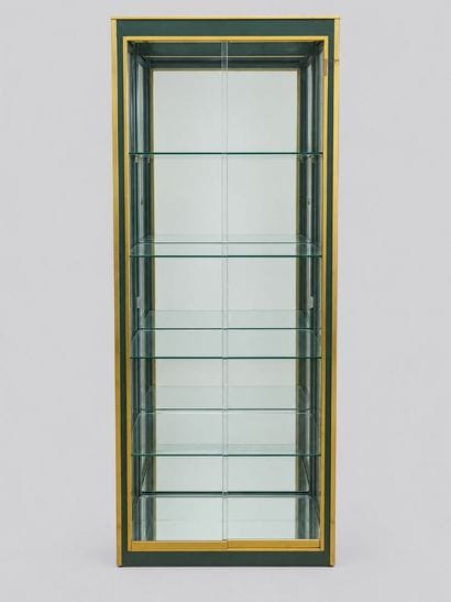 Tall, narrow rectangular display case consisting...