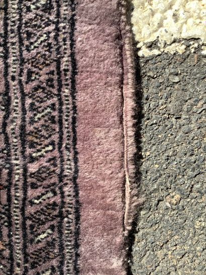 Large, handmade Bukhara-style rug in shades...