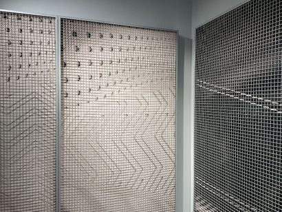 25 mètres linéaires de supports grillagés...