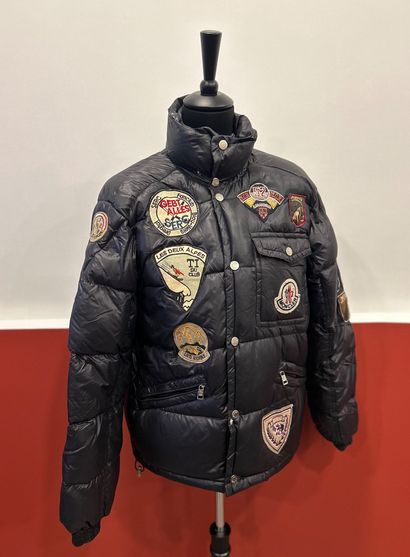 MONCLER 
Black down jacket in polyamide with...
