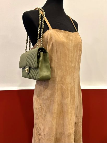 CHANEL 
Beige suede dress with 100% beige...