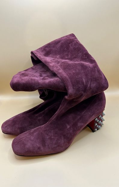 LOUBOUTIN 
Pair of purple suede boots, the...
