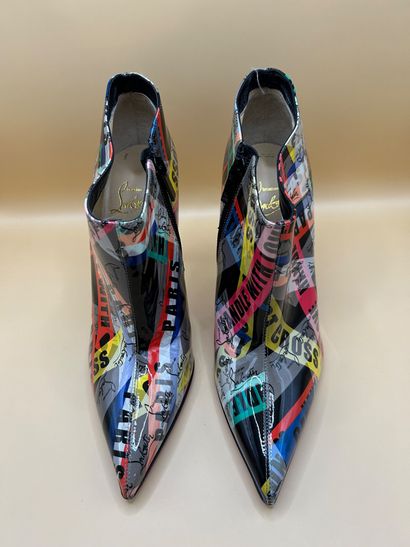 LOUBOUTIN 
Exceptionnelle paire de boots...