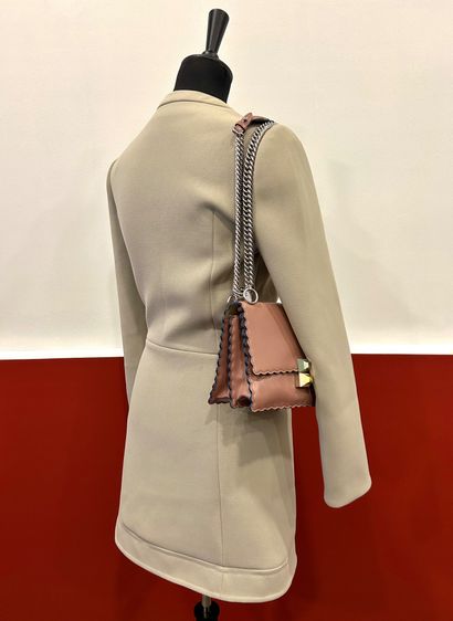 CARVEN 
Beige polyester snap dress with two...