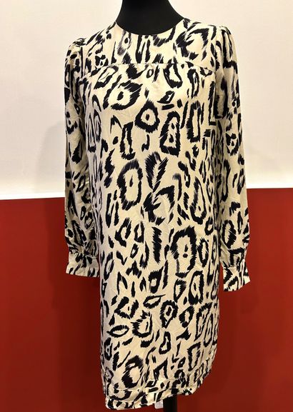 CHLOE 
Black leopard dress on beige background...