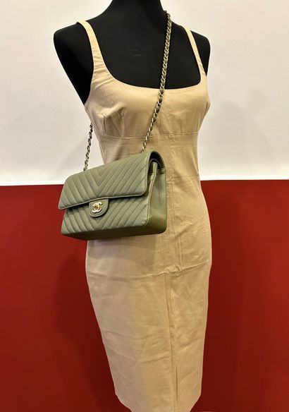 DOLCE & GABBANA 
Strapless dress in beige...