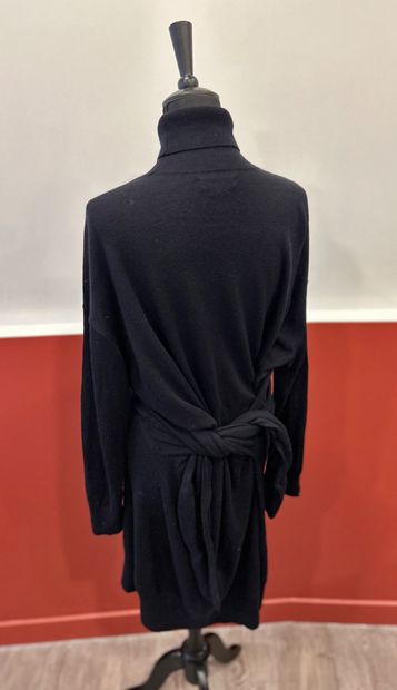 ISABEL MARANT 
Navy turtleneck and belted...