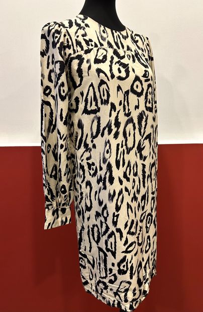 CHLOE 
Black leopard dress on beige background...