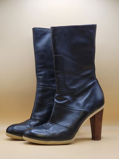 JIL SANDER
Paire de boots à talon en cuir...