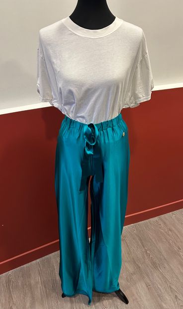 ROBERTO CAVALLI
Green silk flared pants with...