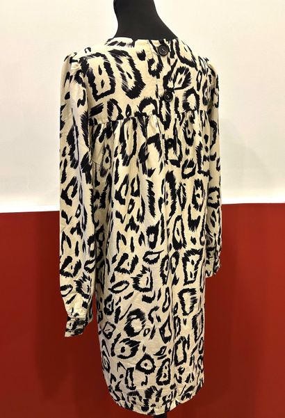 CHLOE 
Black leopard dress on beige background...