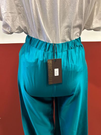 ROBERTO CAVALLI
Green silk flared pants with...
