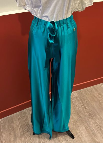 ROBERTO CAVALLI
Green silk flared pants with...