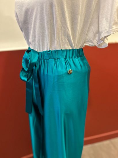ROBERTO CAVALLI
Green silk flared pants with...