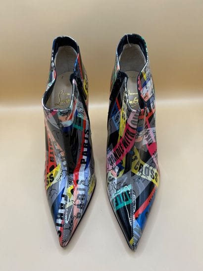 LOUBOUTIN 
Exceptionnelle paire de boots...