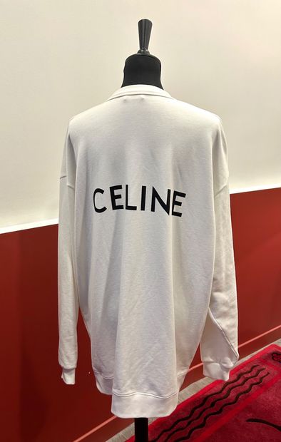 CELINE 
Cardigan matière sweat 100% coton...