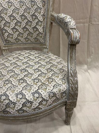 Child's armchair in molded, carved and cream...