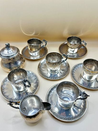 Set of six cups, six saucers, a milk jug...