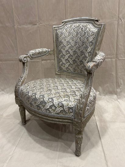 Child's armchair in molded, carved and cream...