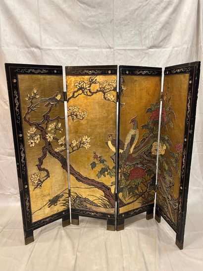 CHINA
Four-leaf folding screen in blackened...