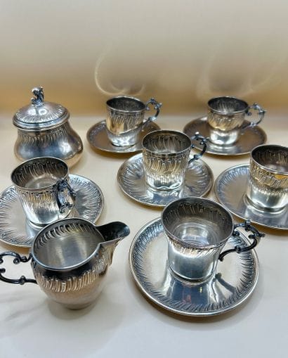 Set of six cups, six saucers, a milk jug...