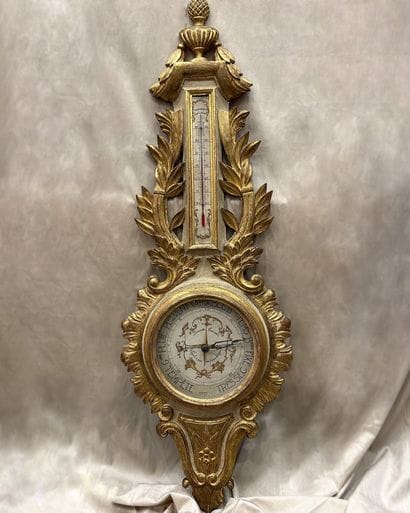 Carved, chased and gilded wood barometer...
