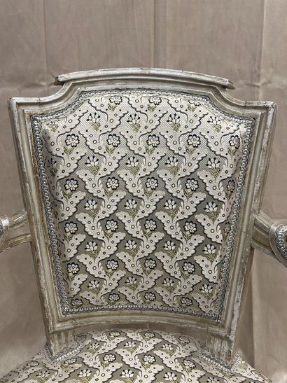 Child's armchair in molded, carved and cream...
