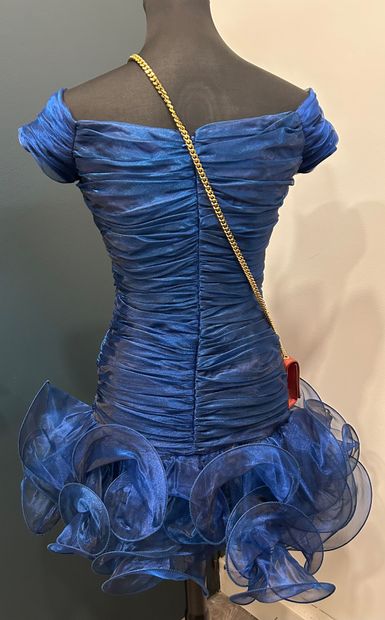 DAVID FIELDEN 
Blue frilly cocktail dress...