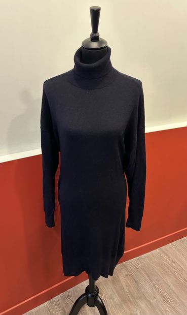 ISABEL MARANT 
Navy turtleneck and belted...