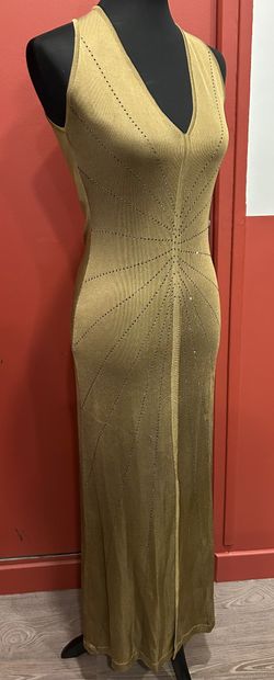 NORA ATTALAI 
Khaki knit dress adorned with...