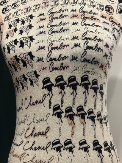 CHANEL 
100% cashmere tank top with camellia...